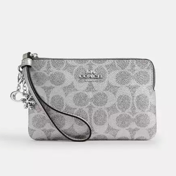 Coach Handbags - Coach Boxed Corner Zip Wristlet In Signature Canvas With Charms